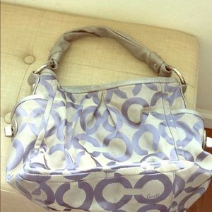 Purple and silver coach bag. Fairly worn.